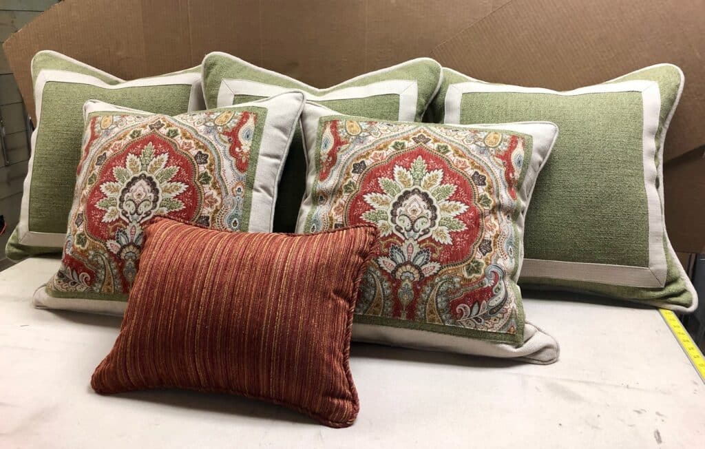 set of custom green accent pillows