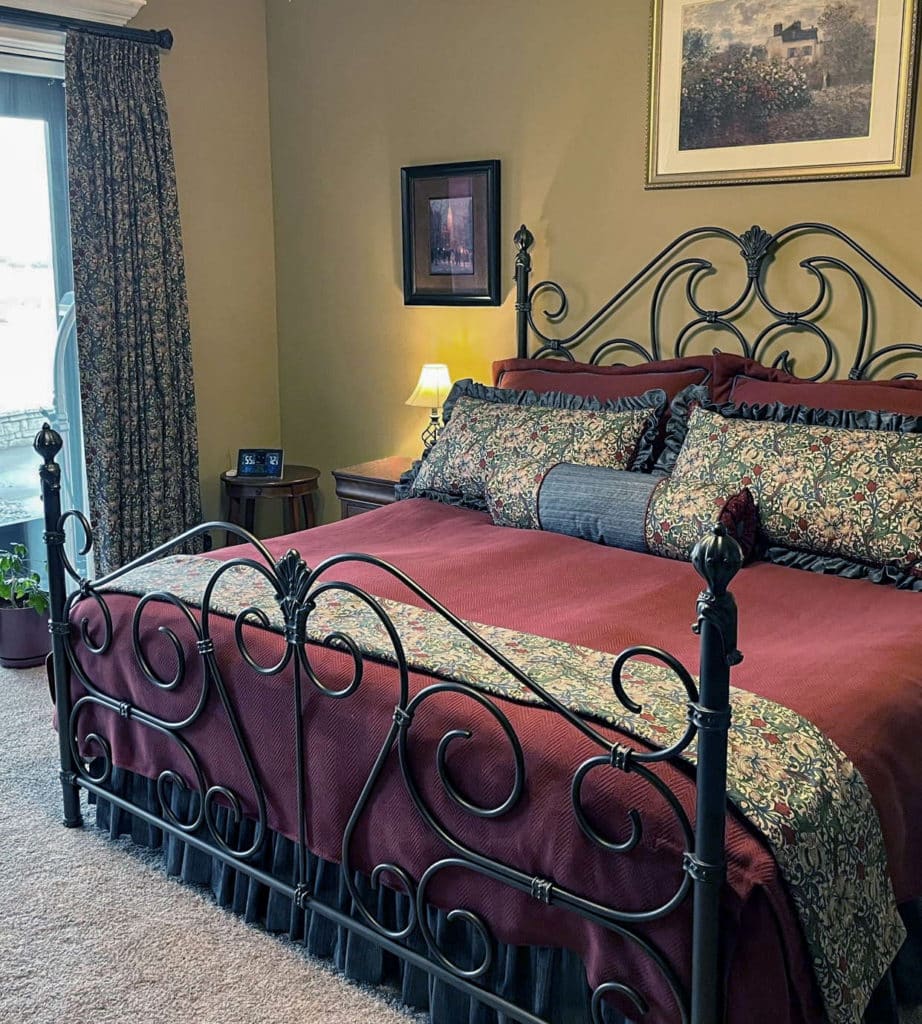 Custom red bedding and custom curtains.