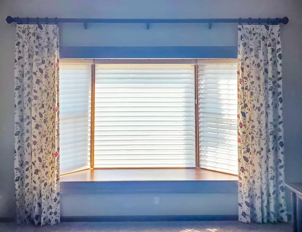 floral curtains in reading nook