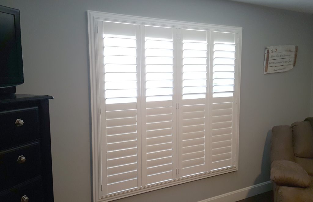 Window coverings with adjustable shutters