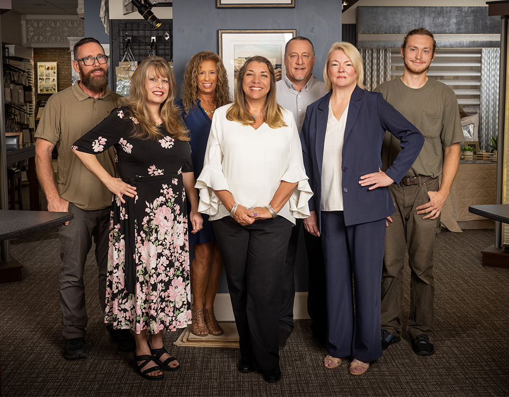 Jennaver and Gordon Brown and their team at the Eye on Design gallery in Belleville, Illinois