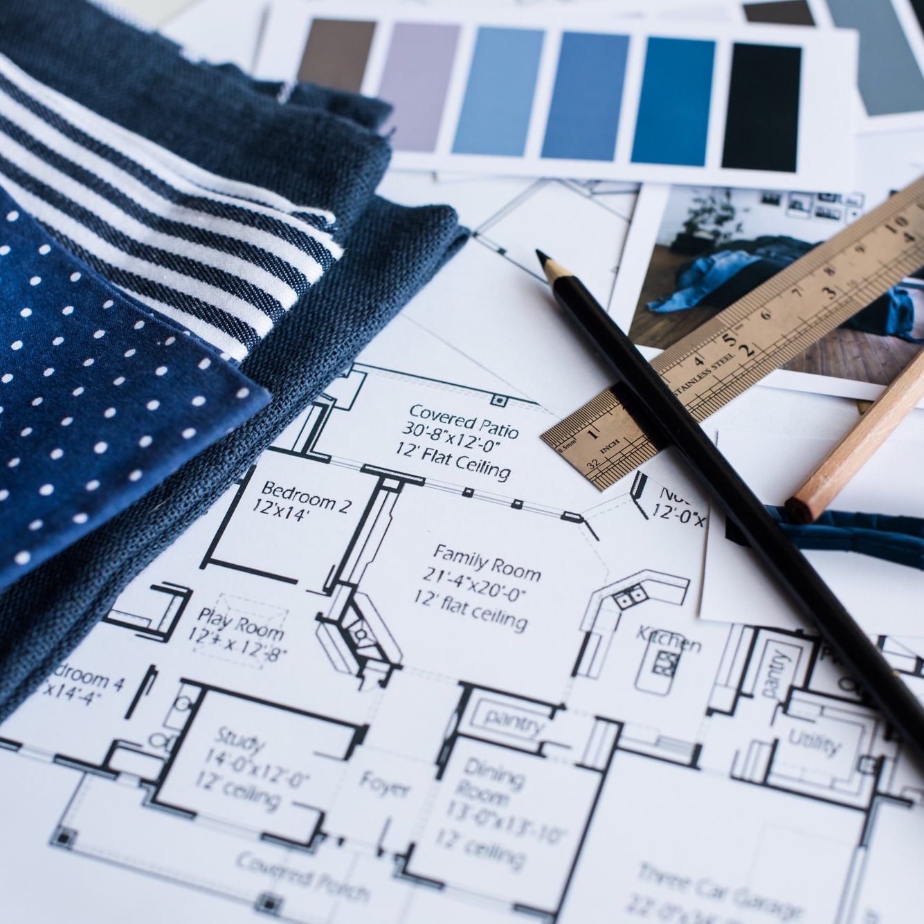 Fabric, blueprints and items used for interior design.